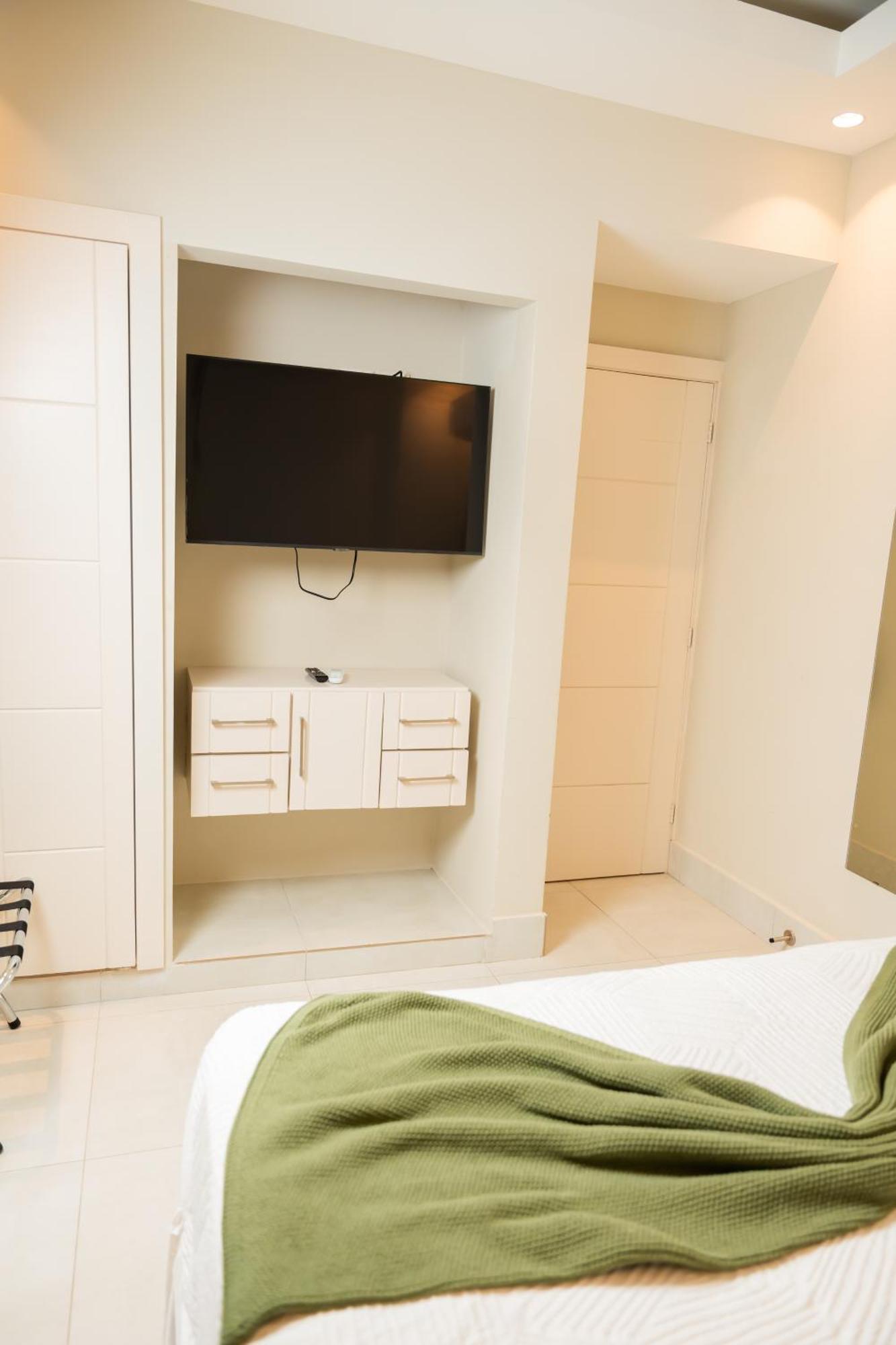 Hotel Stay Here Suites Santo Domingo Camera foto